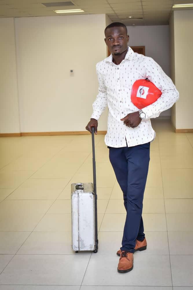 Ganiyu Muntaka A., Managing Director and CEO of BOL Engineering, holding a red branded hard hat